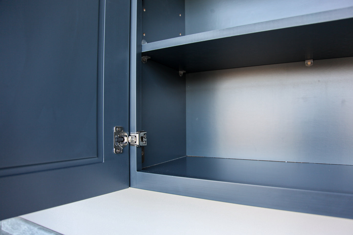 Pacific Blue Raised Panel Cabinets